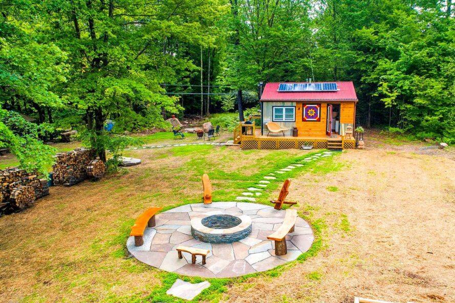 Outdoor fire pit tiny home.